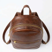 Top view of brown handmade Moroccan leather backpack showing opening and panel construction