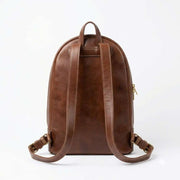 Back view of brown Moroccan leather backpack showing rear straps and leather construction