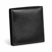 Black leather bifold wallet detail, folded exterior with visible texture and edge stitching