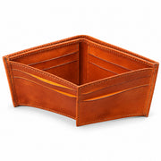Cognac brown leather bifold wallet, angled interior view showing layered card compartments