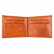 MARZAVEL cognac bifold leather wallet opened flat, showing internal card pockets and stitching