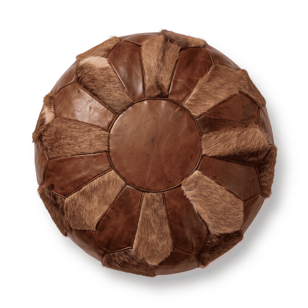 Brown and tan patchwork Moroccan round leather pouf against white