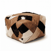 Brown and ivory patchwork square Moroccan leather pouf against a white background